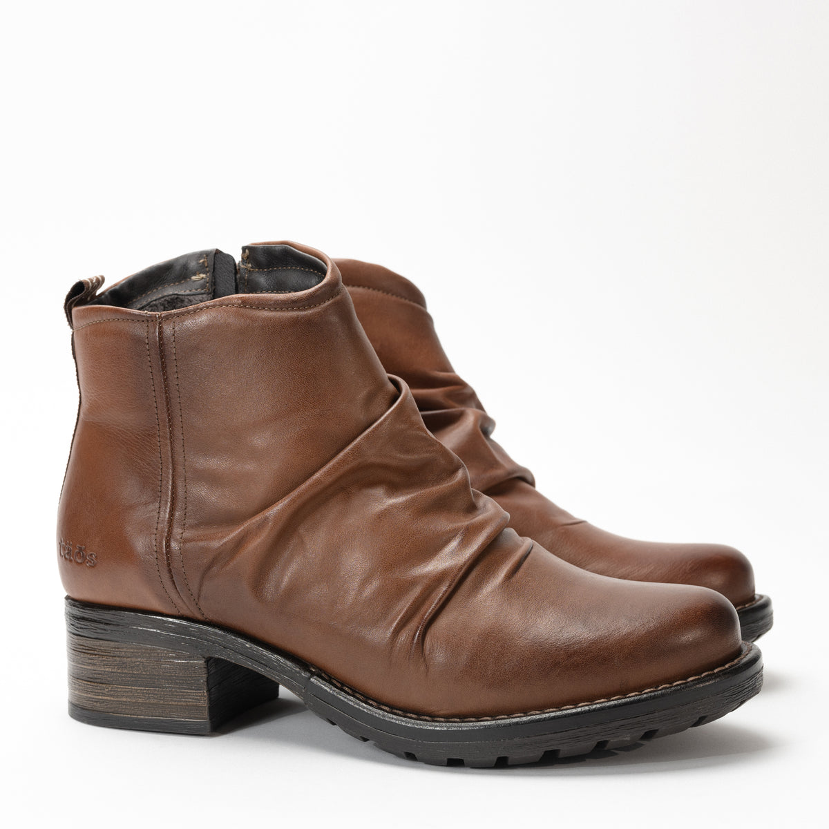 Side view of Women's Taos Ravelle slouch leather bootie with burnished leather finish.