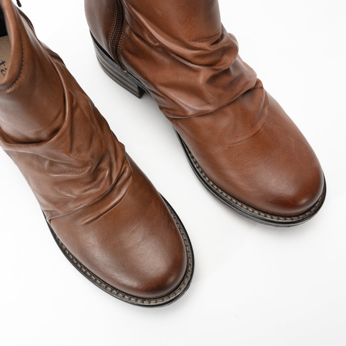 Overhead view of Women's Taos Ravelle bootie with burnished leather finish and rounded toe design.