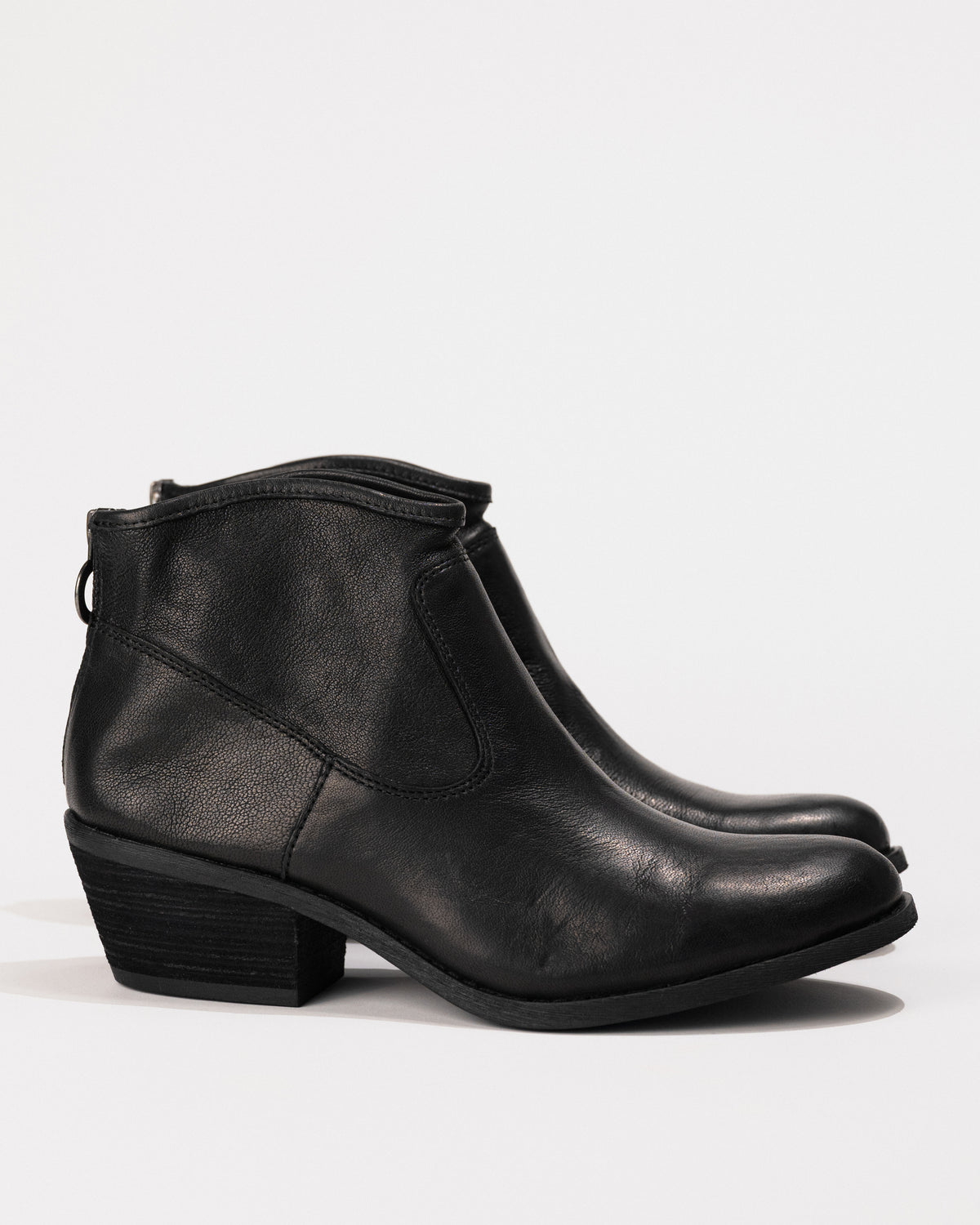 Profile of the Sofft Aisley bootie in Black Italian leather showing curved ankle shape and stacked heel.
