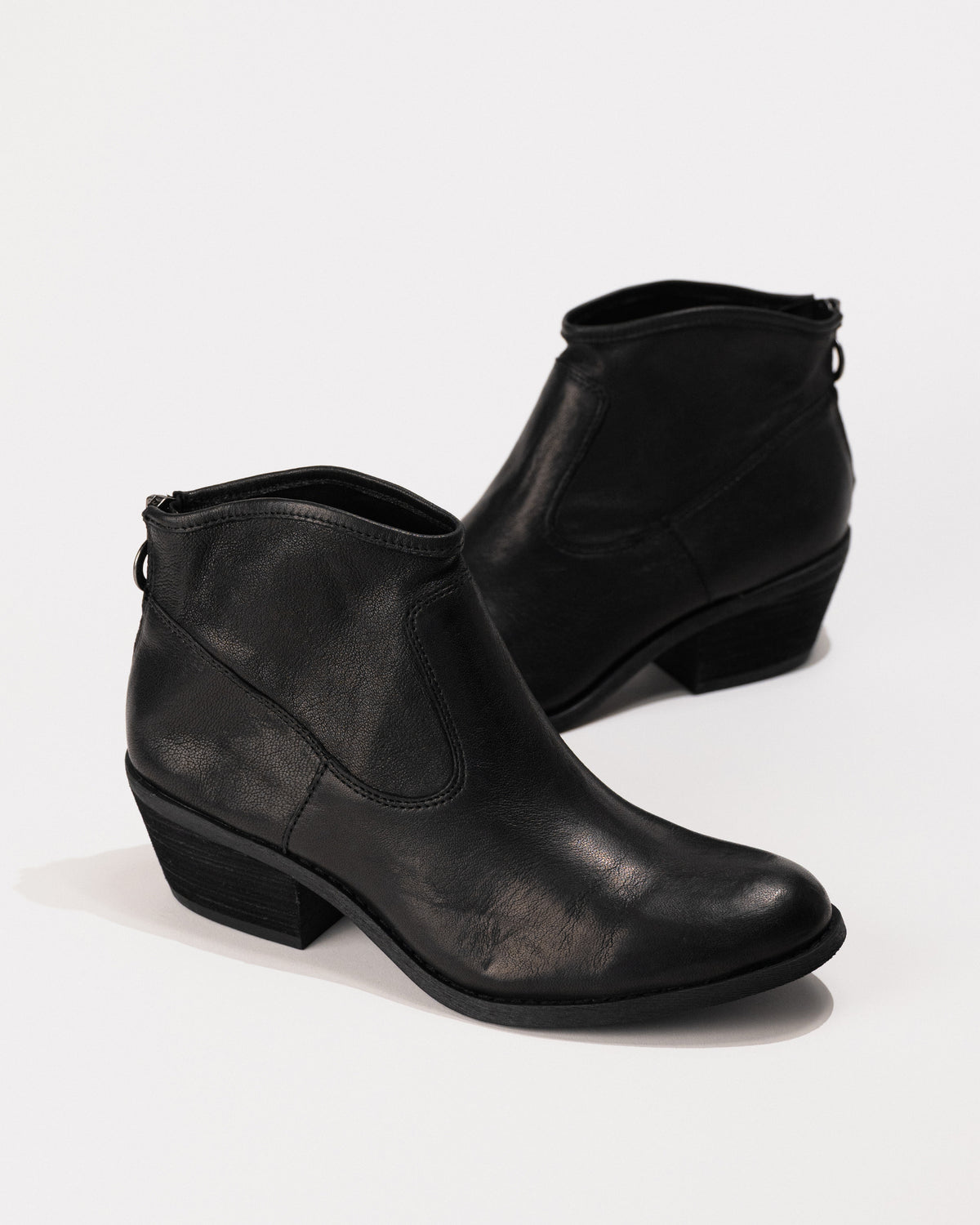 Profile of the Sofft Aisley bootie in Italian leather showing curved ankle shape and stacked heel.