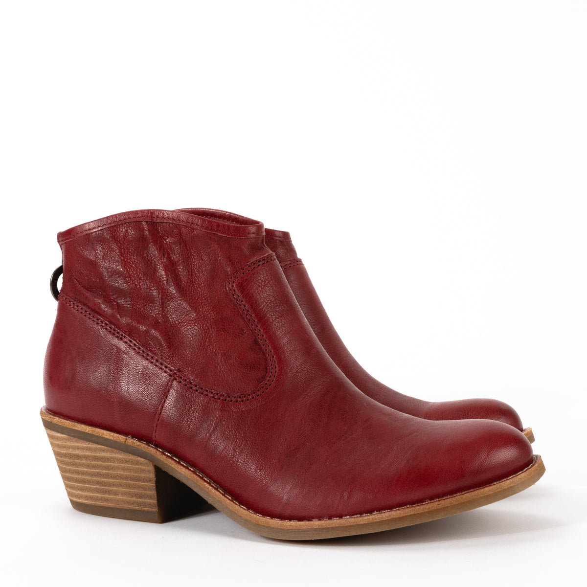 Front view of the Sofft Aisley western-inspired bootie, showcasing soft Italian leather and a curved silhouette for stylish appeal.