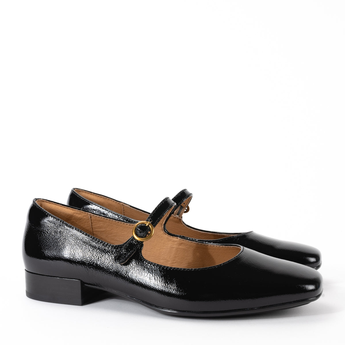 Side view of Sofft Elsey mary jane flat in Italian leather with refined square toe, 1-inch heel, and lightweight TPU outsole for day-to-night comfort.