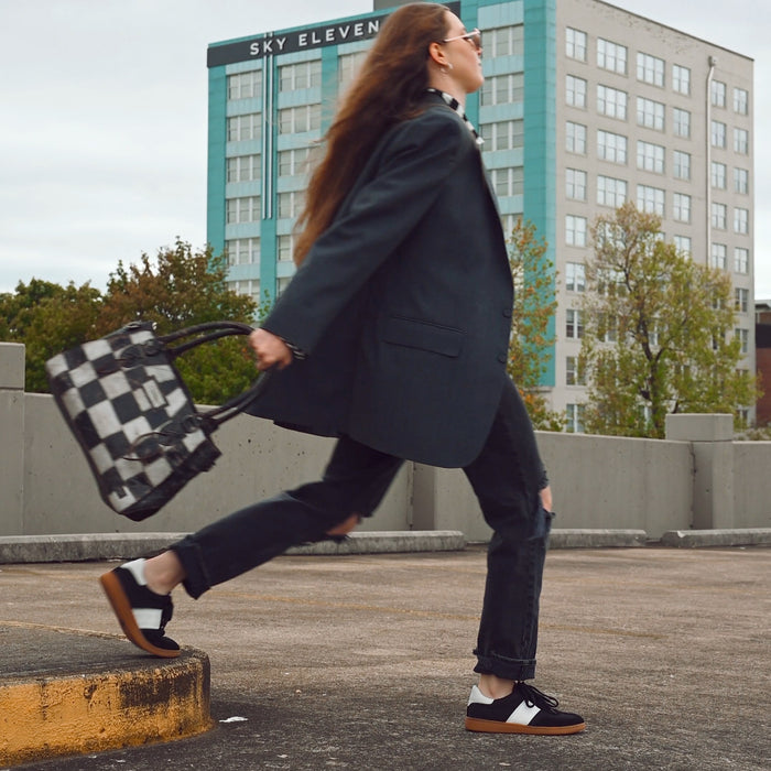 Women's Sofft Ruby Lace-Up Sneaker in Black - SF0105801
These fresh retro sneakers go from off-duty chic to officewear effortlessly.
Pair the Sofft Ruby with denim for weekend errands and with trousers for a modern-cool work look.