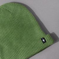 Detail knit view of the soft and cozy Men's and Women's The Smartwool Beanie in Fern Green merino wool