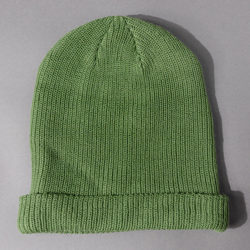 Backside view of the soft and cozy Men's and Women's The Smartwool Beanie in Fern Green merino wool