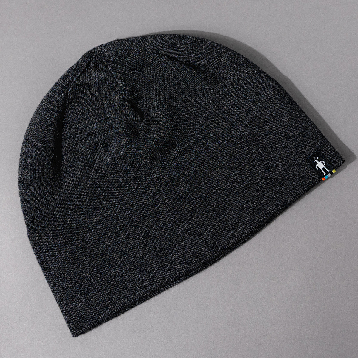 Overhead detail view of the simple Men's Smartwool The Lid Beanie Hat in Charcoal/Gray, a basic woven hat for everyday warmth.