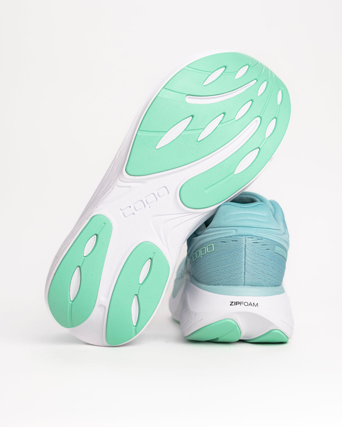 The Women's Topo Atmos 2 in Aqua/Mint is the softest ride in the Topo lineup, built for those high-mileage days where comfort is the only thing that matters. This second-generation model features an even deeper bed of upgraded ZipFoam™, providing a plush, energetic feel that doesn't pack out over time. While many max-cushion shoes can feel clunky, the Atmos 2 uses a refined rocker geometry to keep your stride feeling smooth and fluid from heel-strike to toe-off.