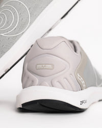 Collapsible heel on the women's Topo ST-6 is built for the runner who prefers a "less is more" approach. It’s the most minimalist model in Topo’s road lineup, sitting on a low-profile 14mm platform with absolutely zero drop from heel to toe. This design is all about promoting a natural, grounded gait while providing just enough ZipFoam™ cushioning to take the sting out of the pavement. If you’re looking for a shoe that lets your foot move exactly how it was meant to, this is a top contender.