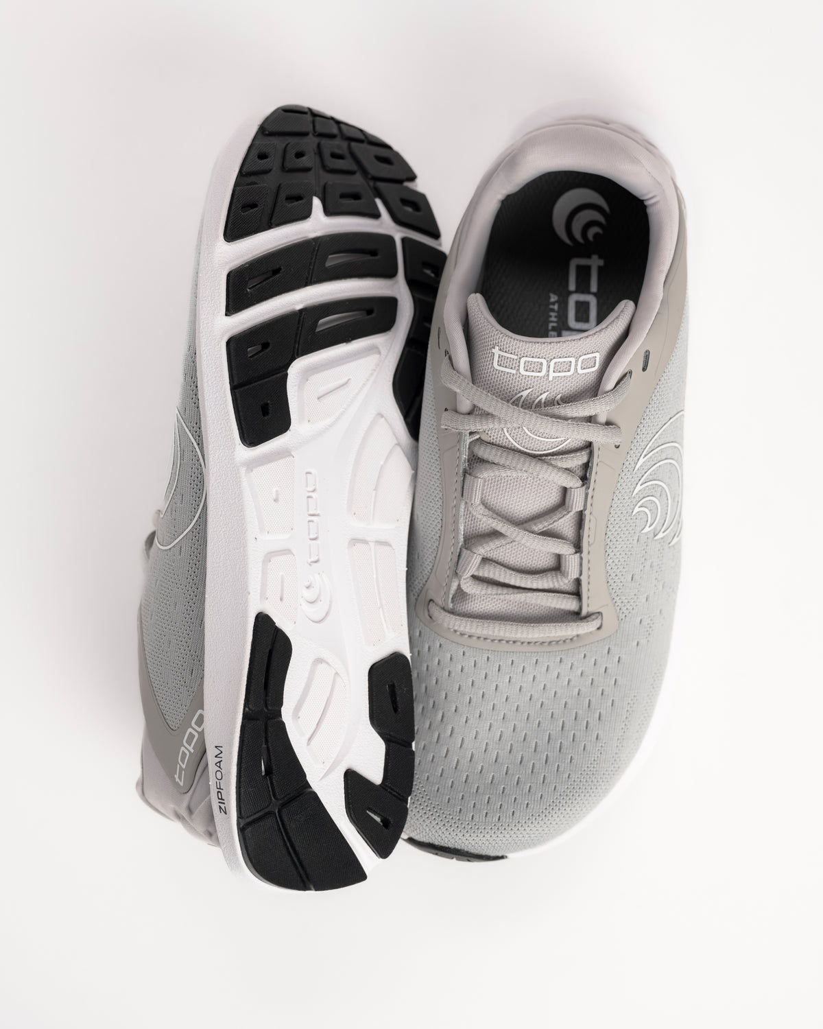 The Women's Topo ST-6 is built for the runner who prefers a "less is more" approach. It’s the most minimalist model in Topo’s road lineup, sitting on a low-profile 14mm platform with absolutely zero drop from heel to toe. This design is all about promoting a natural, grounded gait while providing just enough ZipFoam™ cushioning to take the sting out of the pavement. If you’re looking for a shoe that lets your foot move exactly how it was meant to, this is a top contender.