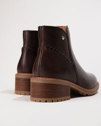 Rear view showing the heel height and seam details of the Medina ankle boot.