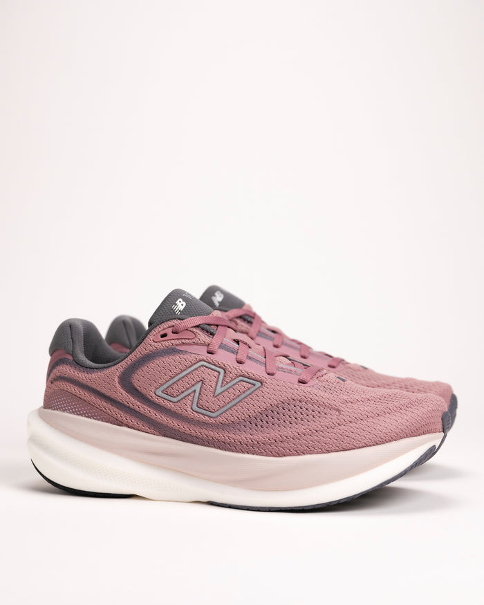 Side view of New Balance 1080v15 women’s running shoe in Rosewood/Silver Metallic showing Infinion foam cushioning