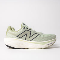 Side view of the New Balance Fresh Foam X 1080 V14 in Natural Mint and Magnet, highlighting the rocker profile and Fresh Foam X cushioning.