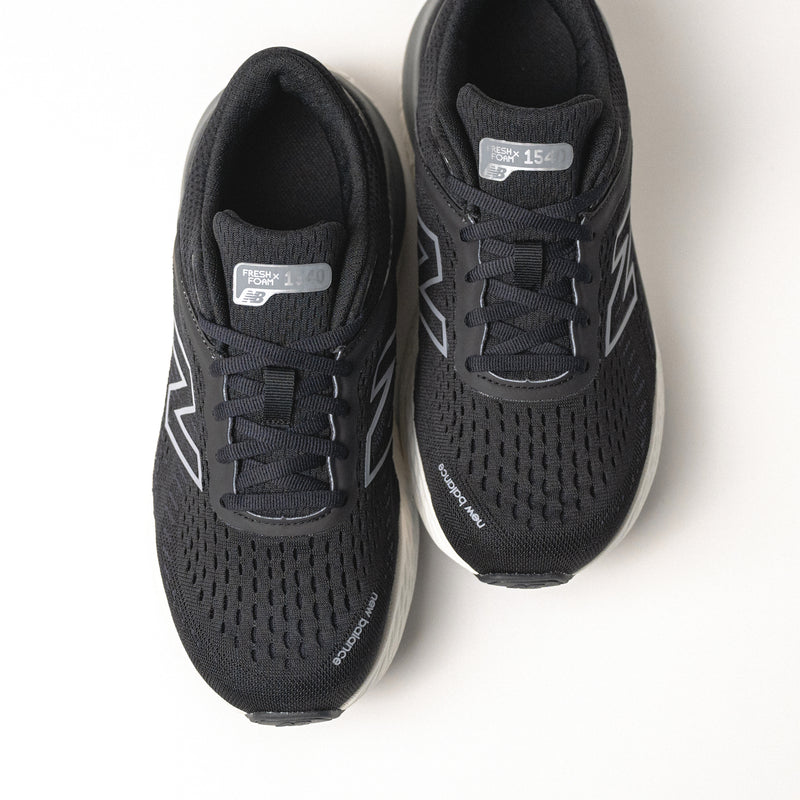 Top view of the Women's New Balance 1540 V4 showing engineered-knit upper and lace closure.