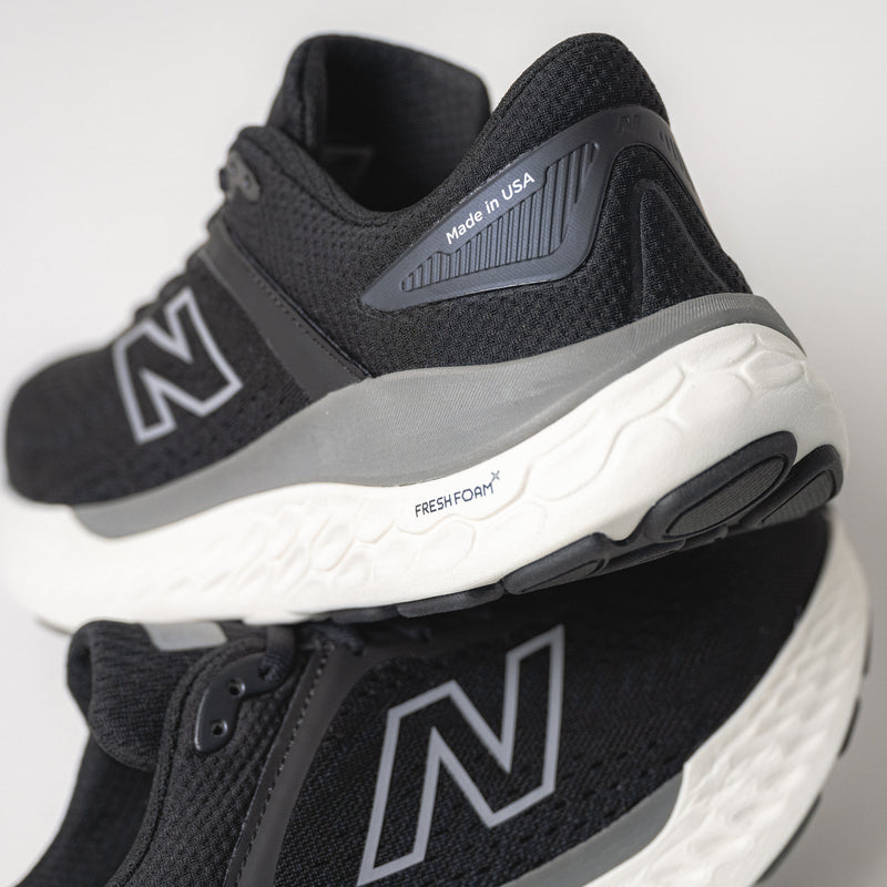 Rear angle highlighting the ROLLBAR® stability post system on the Women's New Balance Fresh Foam X 1540 V4 and Made in USA logo.