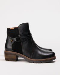 Full profile of the San Sebastian Boot in calfskin leather with visible block heel.