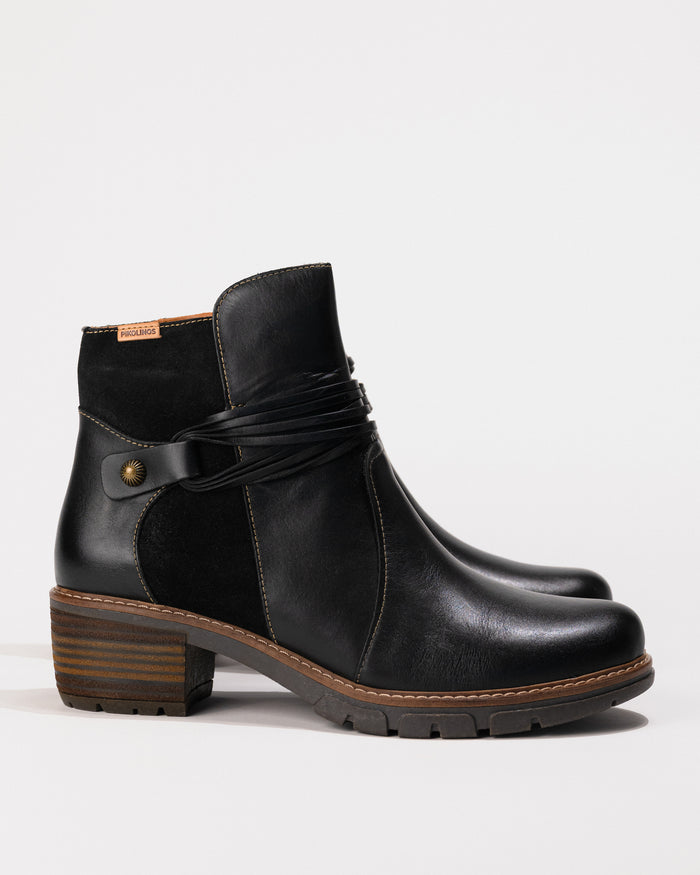 Full profile of the San Sebastian Boot in calfskin leather with visible block heel.