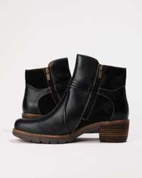 Side shot displaying the inner ankle and easy-on zipper entry.