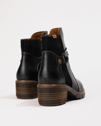 Rear view showing the sleek back seam and subtle heel shaping.