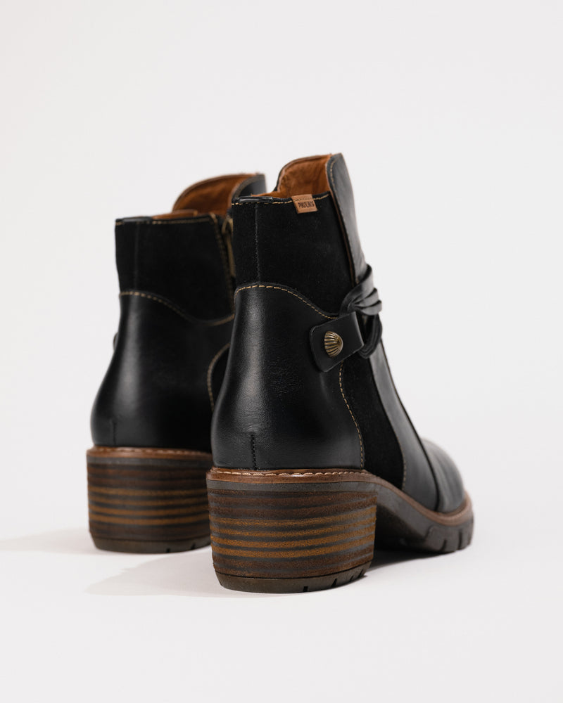 Rear view showing the sleek back seam and subtle heel shaping.