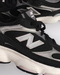 New Balance Classics 603 Sneaker – Modern Sculpted Streetwear Runner in Black / Dark Silver Metallic