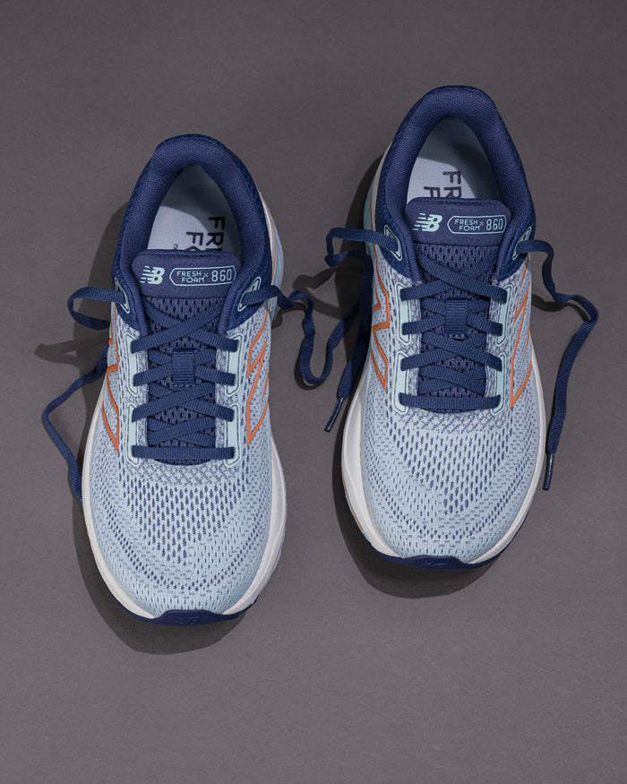 Pair of blue and gray running shoes on a dark background Women's New Balance Fresh Foam X 860 v14 Stability Shoe in Frost