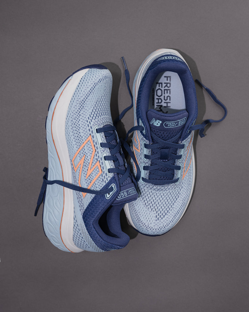 Pair of blue and gray running shoes on a gray background Women's New Balance Fresh Foam X 860 v14 Stability Shoe in Frost