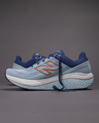 Blue and orange running shoes on a gray background Women's New Balance Fresh Foam X 860 v14 Stability Shoe in Frost