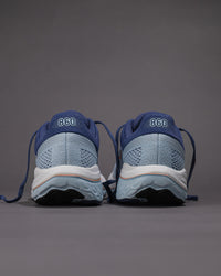 Blue running shoes with '860' branding on a gray background Women's New Balance Fresh Foam X 860 v14 Stability Shoe in Frost