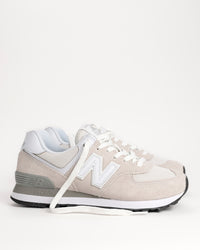 Women’s New Balance 574 sneaker in Nimbus Cloud with white side view on white background