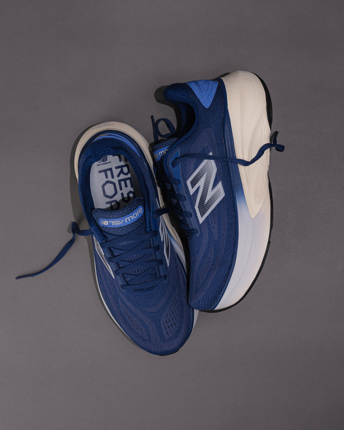 Angled view highlighting the midsole geometry and mesh upper in Blue.