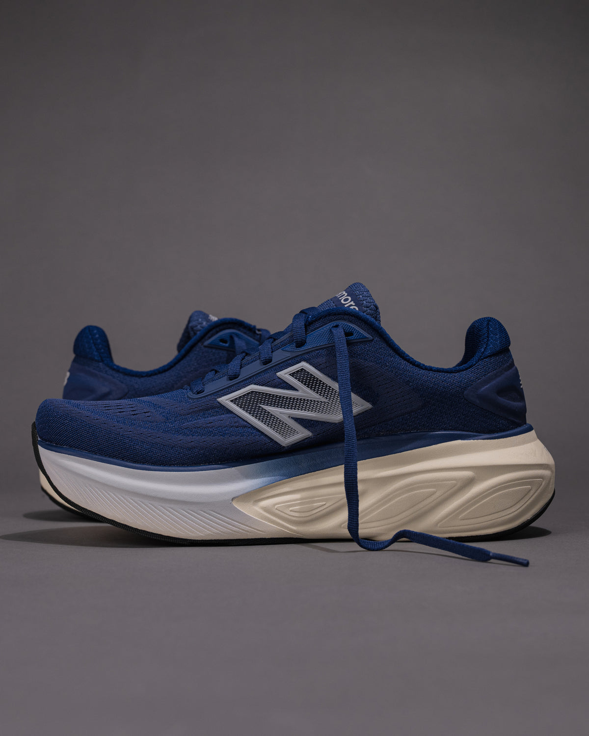 Lateral side view showing external support and New Balance "N" logo placement.