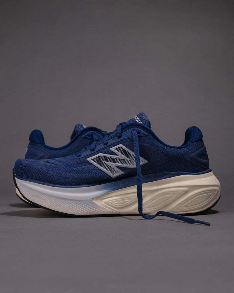 Lateral side view showing external support and New Balance "N" logo placement.