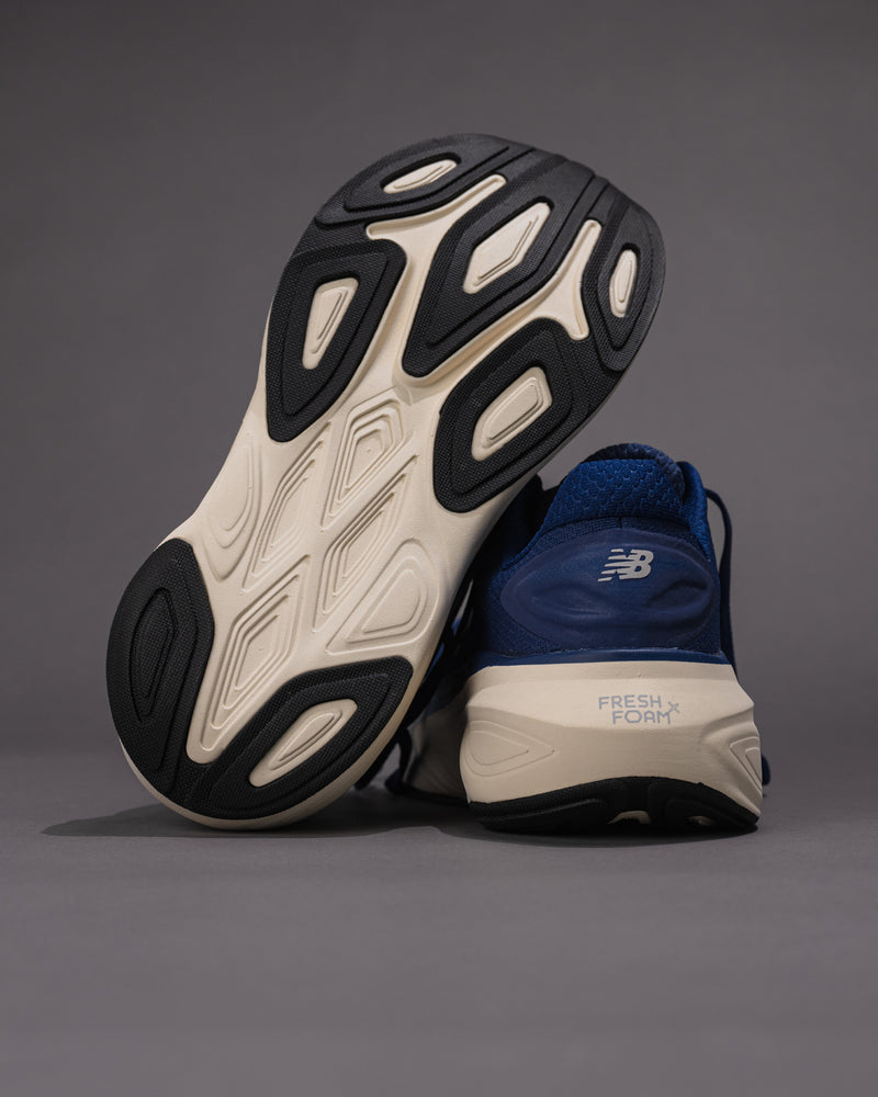 Underside image displaying the rubber outsole and tread pattern for grip.