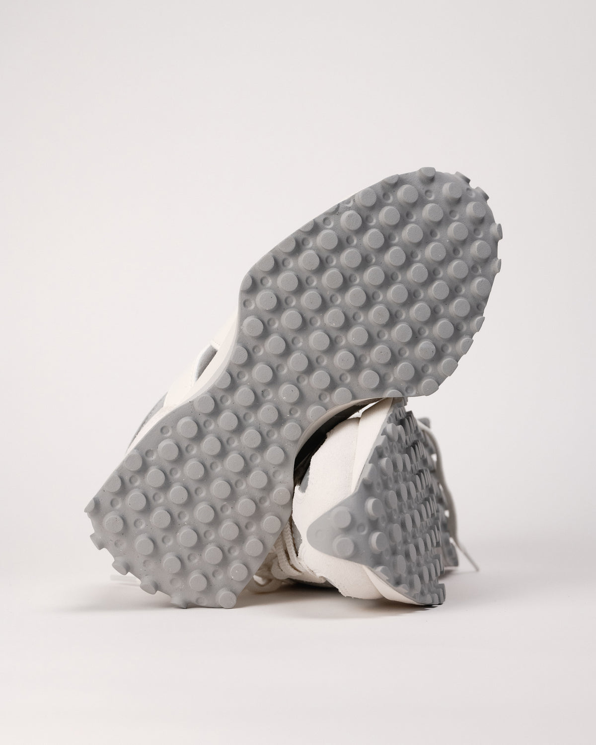 Close-up of trail-inspired outsole on New Balance 327. 