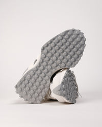 Close-up of trail-inspired outsole on New Balance 327. 